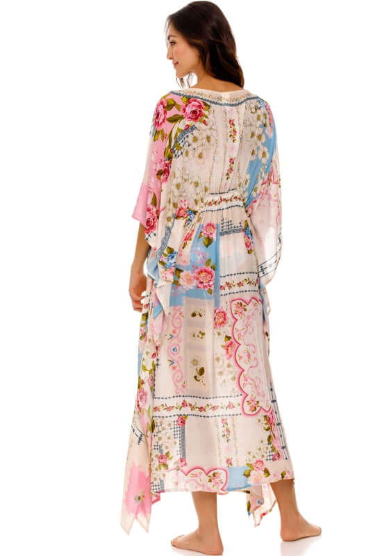 Sam Tunic Meraki by Agua Bendita, showcasing a floral artisan print and elegant design from the back.