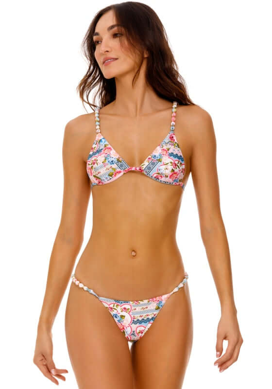 Belle Bikini Top Meraki by Agua Bendita, featuring a colorful floral design and stylish detailing.
