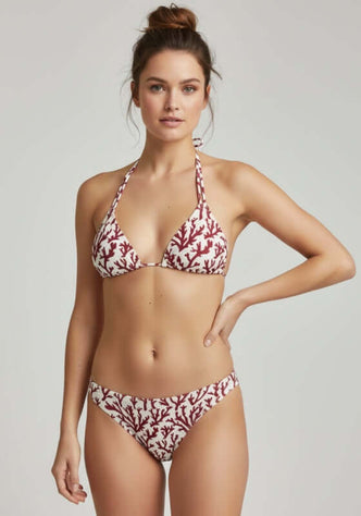 Eva Triangle Bikini Top Deep Coral by Alicia Swim model wearing a stylish bikini in deep coral with coral pattern design.