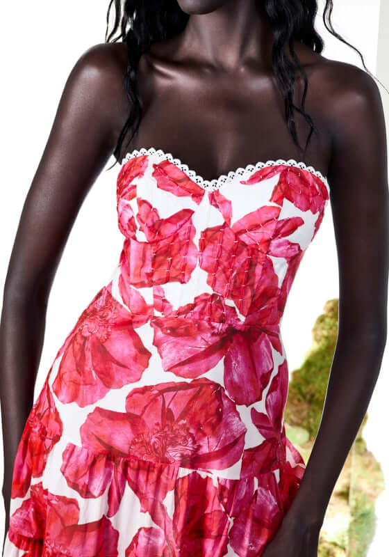 Ambar Long Dress White Blossom by Charo Ruiz featuring a flattering sweetheart neckline and vibrant floral print.