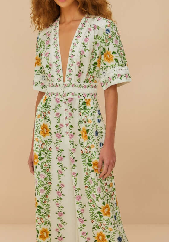 Folk Floral Jumpsuit by Farm Rio, showcasing vibrant floral patterns and a stylish V neckline.