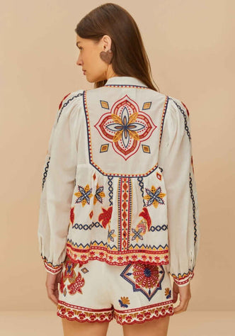 Marys Tiles Embroidered Blouse by Farm Rio, showcasing vibrant tile-inspired embroidery and flowing sleeves from the back.
