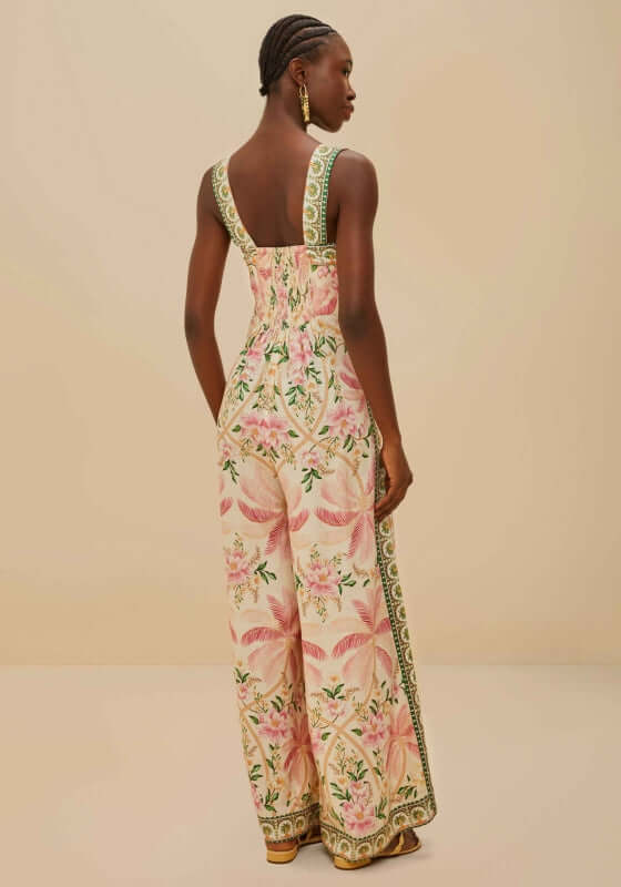 Palm Dream Jumpsuit by Farm Rio, featuring a stylish back view with a floral print and wide straps.