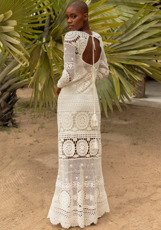 Birkin Dress Miss June by Miss June, showcasing a model in a crocheted maxi dress with a flirty boho style.