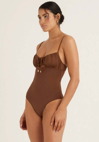 Solstice Ruched Swimsuit Mocha by Peony, showcasing a flattering ruched bustier top with sweetheart neckline.