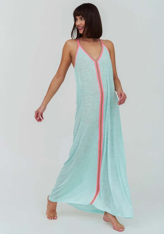 Inca Maxi Sun Dress Aqua by Pitusa, model showcasing a soft semi-sheer jersey dress with a vibrant embroidered neckline.