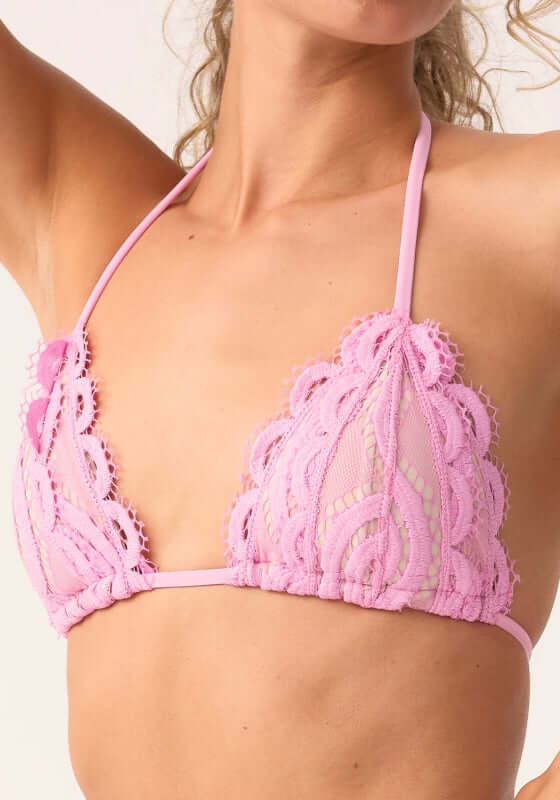 Wisteria Lace Triangle Bikini Top by PQ Swim, featuring a delicate pink lace design and triangle cut.
