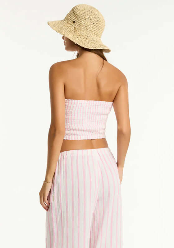 Amalfi Bandeau Top Pink by Sea Level, showing the back view of a fully shirred top paired with matching beach trousers.