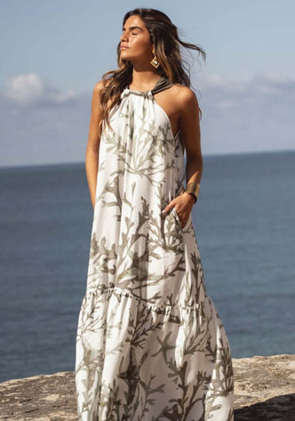 Chloe Dress Garden Taupe by Sole Lisboa, a loose-fitting maxi dress with a halter neckline and muted garden taupe print.