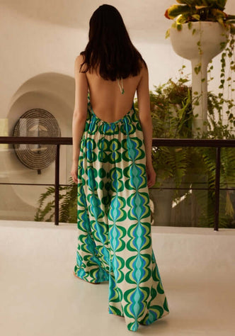 Sophie Jumpsuit Lullah by Sundress showing a relaxed design with a striking green retro print and open back.