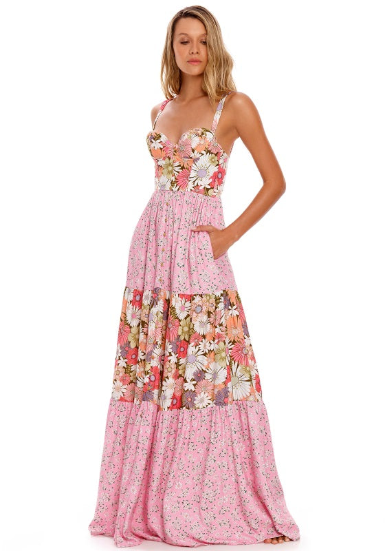 Alani Dress by Agua Bendita featuring a floral bustier top and tiered skirt, perfect for beachwear.