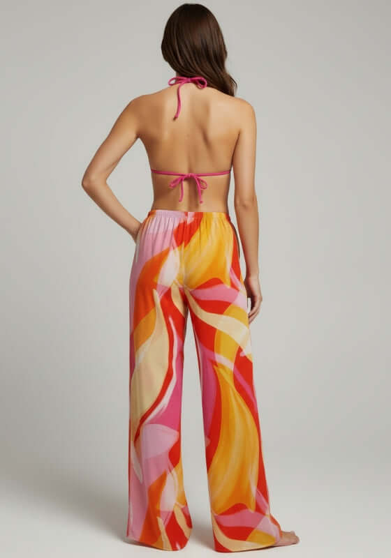 St Barts Beach Trousers Viva Soleil by Away That Day, featuring a vibrant swirly design and lightweight fabric.