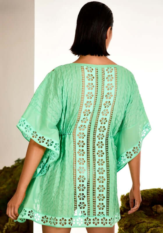 Maisie Kaftan Green by Charo Ruiz, showcasing the elegant back view with floral cutouts in a soft washed green fabric.
