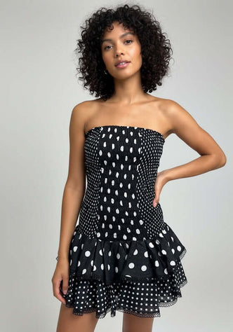 Polkadot Zahara Short Dress Black by Charo Ruiz, smocked bandeau mini dress with tiered skirt and lace trim.