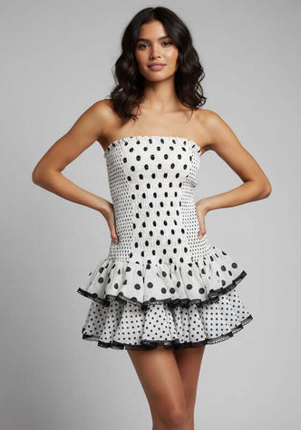 Polkadot Zahara Short Dress White by Charo Ruiz featuring a smocked bandeau neckline and tiered skirt with lace trim.