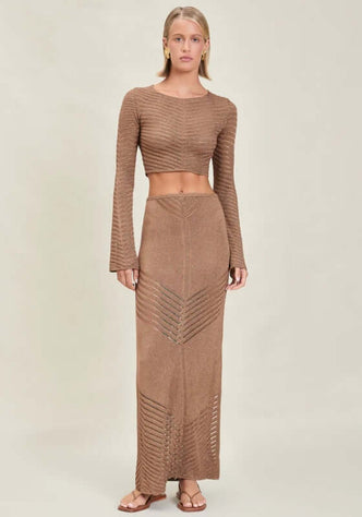 Bria Skirt Truffle by Devon Windsor, a stunning maxi skirt with ladder line details and a shimmery finish.