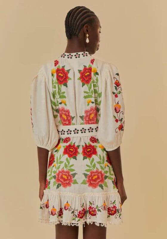 Embroidered Carmina Floral Mini Dress by Farm Rio, showcasing intricate floral embroidery on an off-white mini dress.