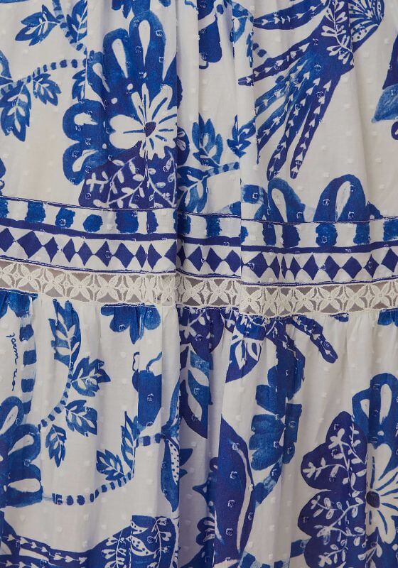 Flowerful Birds Maxi Dress by Farm Rio, showcasing the blue floral print and tiered skirt detail.