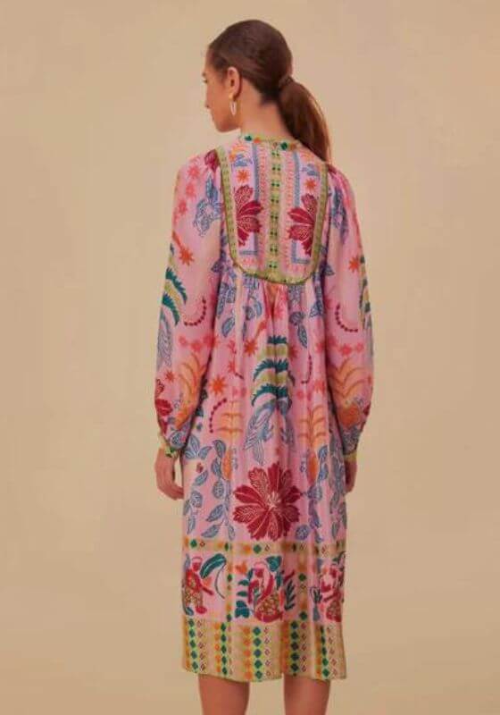Fruits Queen Scarf Midi Dress by Farm Rio, showcasing vibrant floral patterns and long relaxed sleeves from the back view.