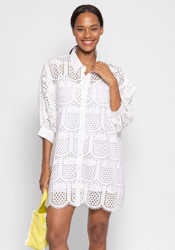 Florine Dress White by Sundress, a short shirtdress in white with pineapple eyelet pattern and flared sleeves.