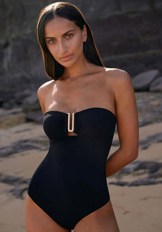 Jetset Bandeau Swimsuit by Jets, a black one-piece with bandeau neckline and U-shaped hardwire.