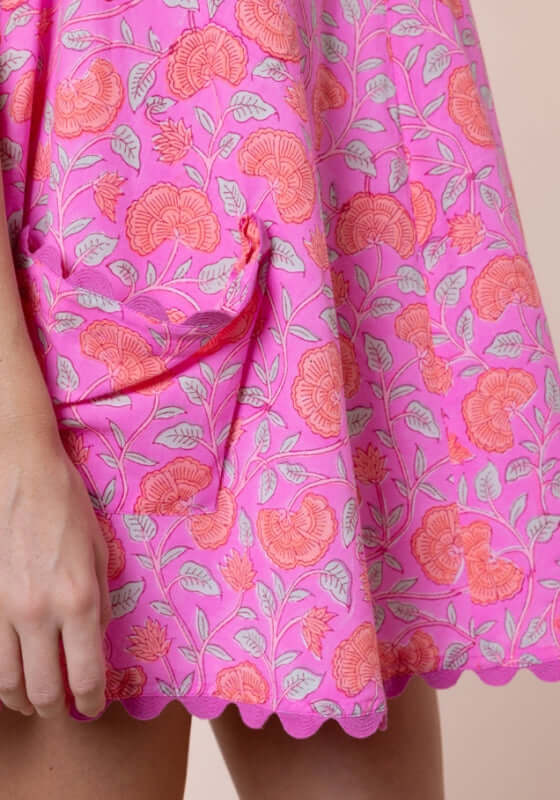 Floral Low Back Dress Fuchsia by Juliet Dunn, showcasing vibrant pink floral print with scalloped hem.
