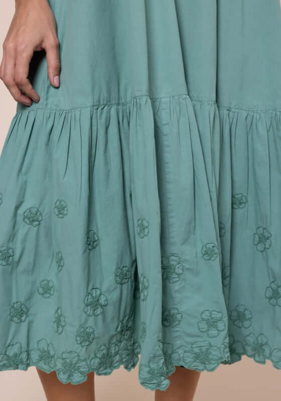 Poplin Midi Dress Cactus by Juliet Dunn, featuring floral embroidery and a flowing skirt in cactus green.