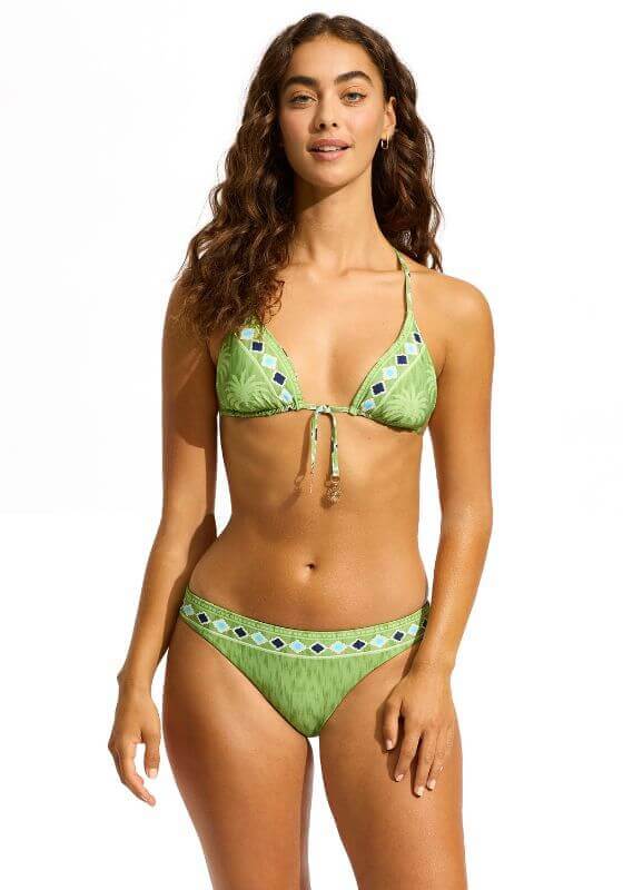 Kasbah Reversible Triangle Bikini Sage by Seafolly model wearing removable padding tie back bikini in sage green.