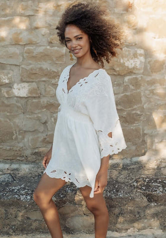 Rodhas Dress White by Piti Cuiti, featuring a breezy V-neckline, floaty sleeves, and delicate embroidery.