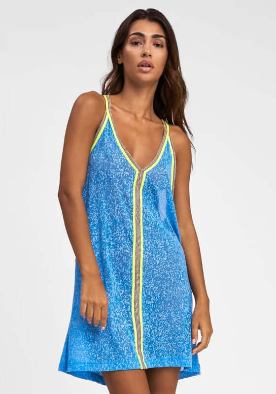Inca Mini Dress Blue by Pitusa model wearing a vibrant blue semi-sheer mini dress with neon accents.