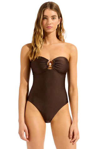 Palermo Ring Front Bandeau Swimsuit Sepia by Seafolly - model wearing a brown bandeau swimsuit with ring detail.