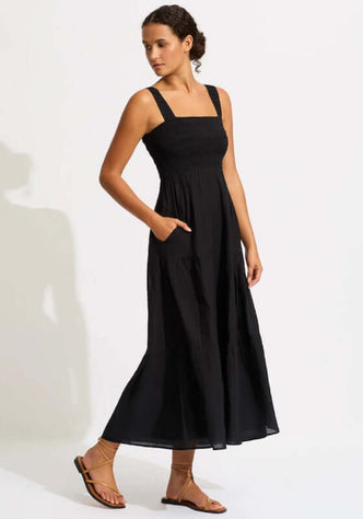 Faithful Midi Dress Black by Seafolly, featuring a smocked top, thick straps, tiered skirt, and pockets.
