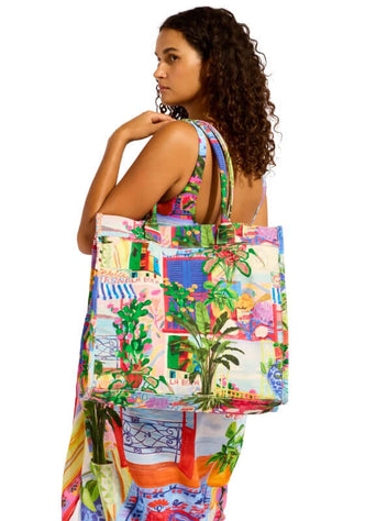 La Boca Tote Beach Bag by Seafolly displayed on a model, featuring a colorful design ideal for tropical beach outings.