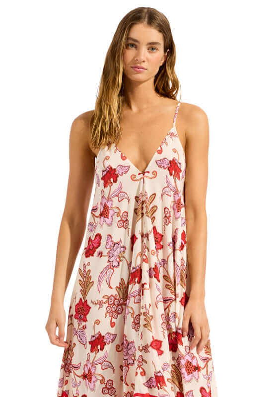 Summerchintz Scarf Dress Ecru by Seafolly, a model showcases a floral print summer dress with a flowing silhouette.