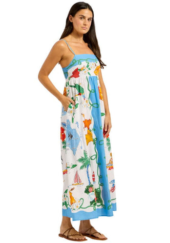 Viva Vacation Maxi Dress by Seafolly, a model wearing a colorful maxi dress with seaside print.