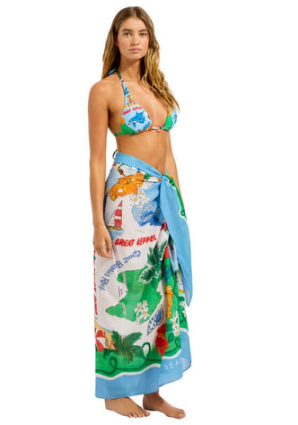 Viva Vacation Sarong by Seafolly, model wearing vibrant sarong with beach print tied at waist.