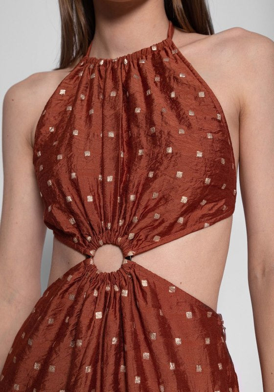 Filiza Dress by Sundress, showcasing rich brown and gold polka dot fabric with halter ties and ring detail.