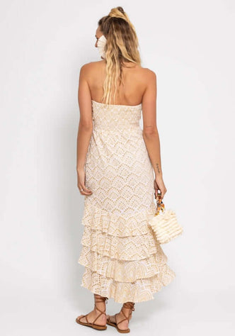 Flavie Dress White by Sundress, back view of strapless dress with tiered ruffles and broderie anglaise.