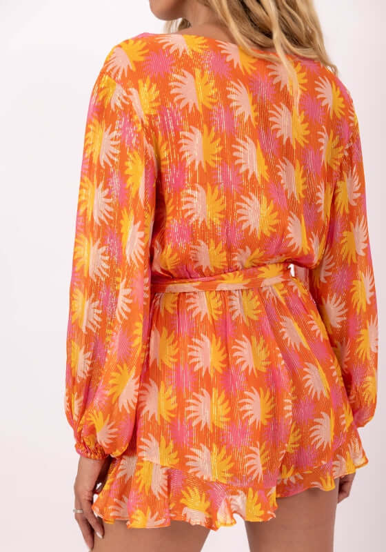 Fleur Jumpsuit Marbella Yuma by Sundress, vibrant back view with adjustable waist and gathered flounce hem.