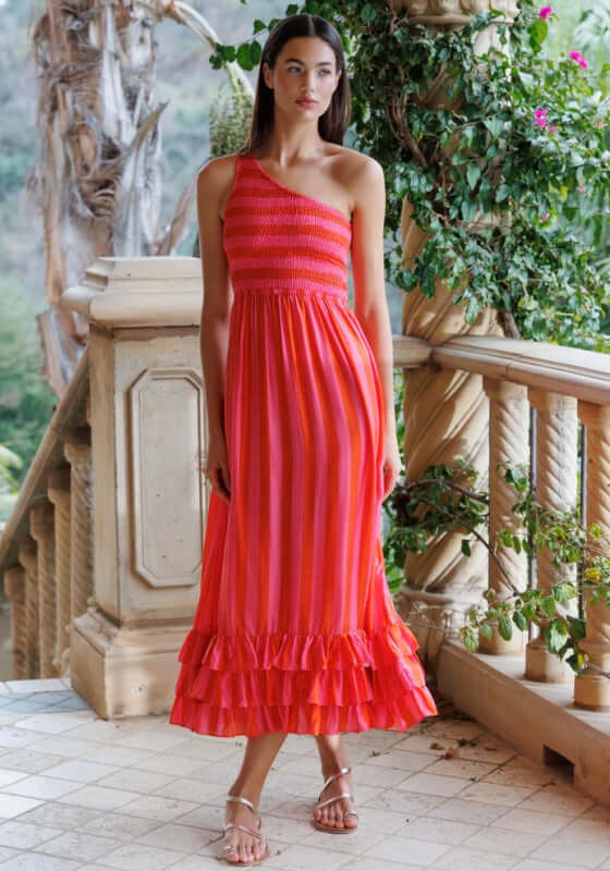 Joemy Dress by Sundress, featuring bold pink and red stripes, asymmetric neckline, and tiered ruffle bottom.