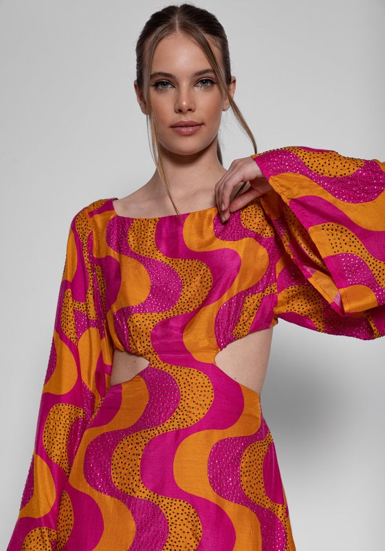 Ludivine Dress by Sundress in fuchsia and orange spiral print with rhinestone highlights and flared sleeves.