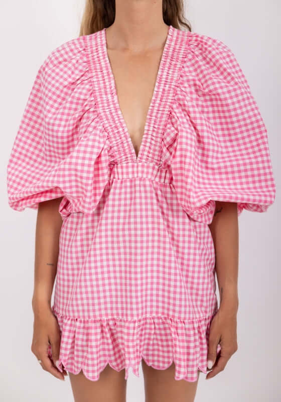Marine Short Dress by Sundress featuring a pink gingham design, kimono sleeves, and scalloped bottom.