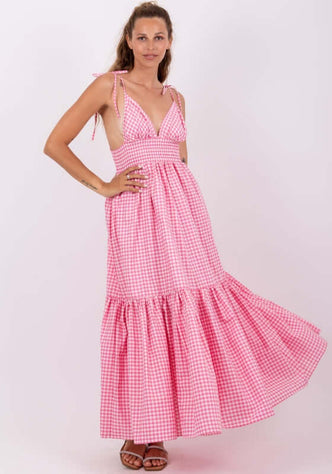 Yolanda Dress Pink Gingham by Sundress, featuring a flared bottom and open back design, perfect for summer occasions.