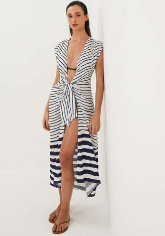 Symphonie Sasha Long Cover Up by Vix, model wearing black and white striped coverup with deep v neckline and knot detail.