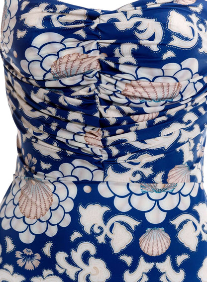 Arista Sereia Dress by Agua Bendita featuring ruched design and floral pattern in blue and white.