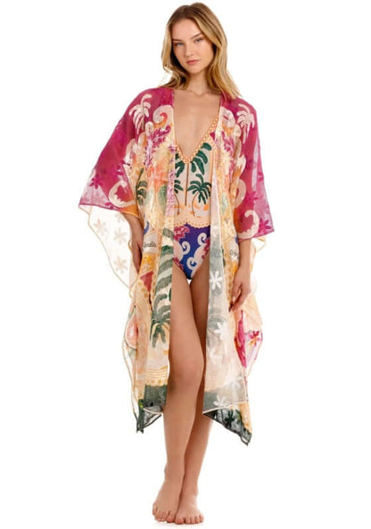 Atzi Tunic Thamar by Agua Bendita, lightweight mesh cover-up showcasing a tropical design over swimwear.