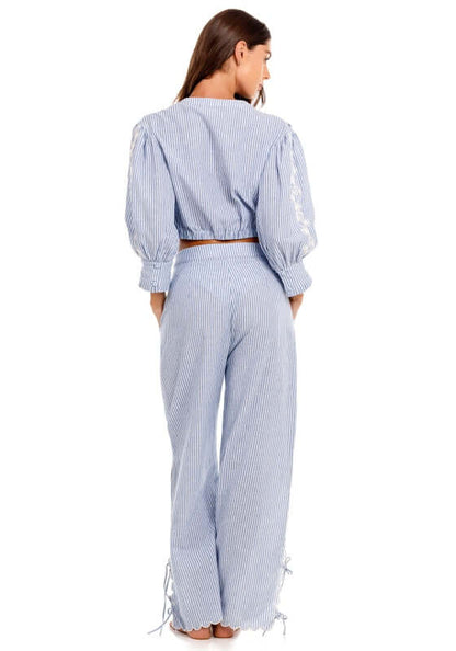 Isolda Batik Top by Agua Bendita, featuring a chic back view with puff sleeves and striped pattern.