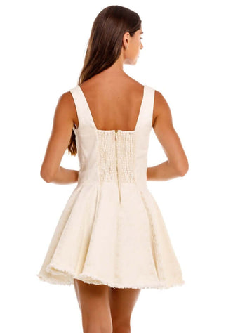 Kristen Sereia Dress by Agua Bendita, back view showcasing structured bodice and pleated skirt.