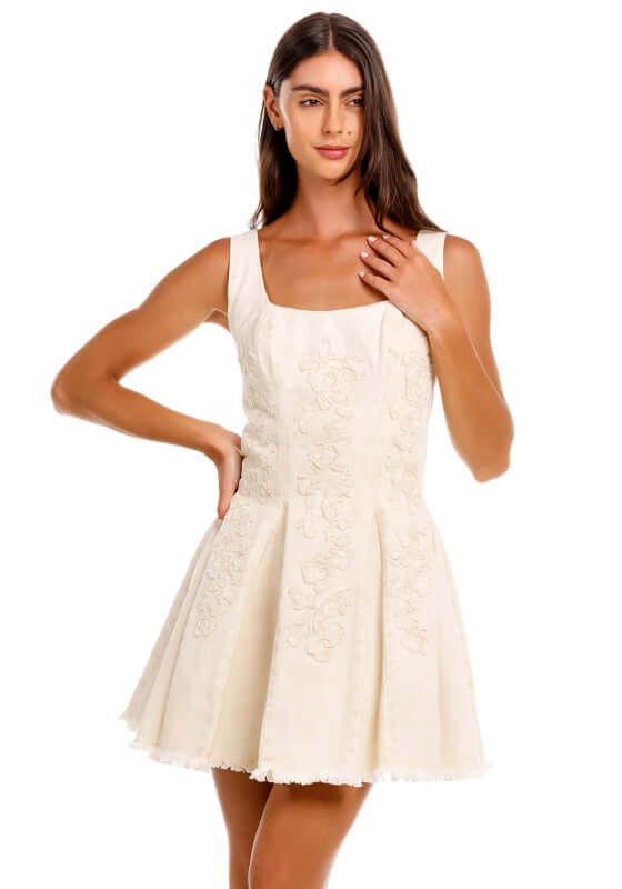 Kristen Sereia Dress by Agua Bendita, featuring a structured bodice and pleated skirt, perfect for day to night.