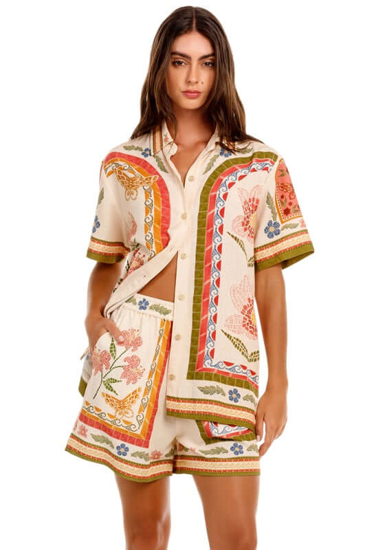 Watts Fiore Beach Shorts by Agua Bendita, featuring a striking floral print and a matching shirt for effortless beach style.
